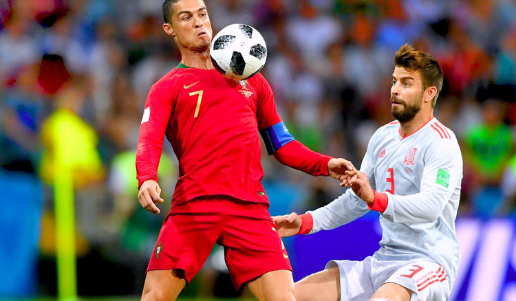 Ronaldo keeps Spain at bay with a spectacular hattrick