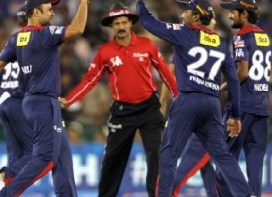 Delhi Daredevils crushed Pune Warriors India by 15 runs lifting itself from the bottom