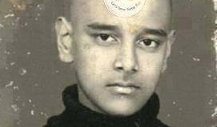 Identify Cricketer from his childhood photo ?